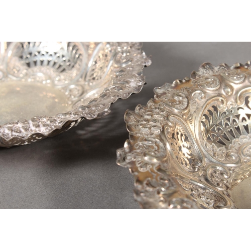 13 - Pair of Scottish silver pierced bowls with heavy repousse decoration, 18cm diameter, Hamilton & ... 