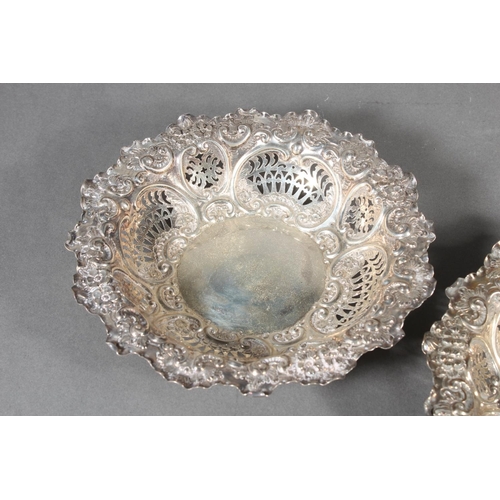 13 - Pair of Scottish silver pierced bowls with heavy repousse decoration, 18cm diameter, Hamilton & ... 