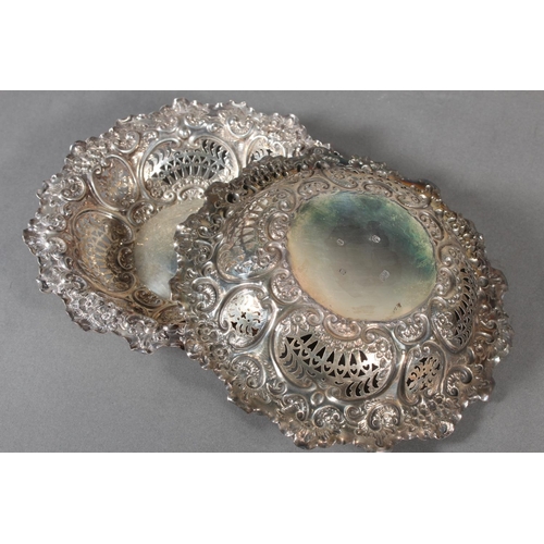 13 - Pair of Scottish silver pierced bowls with heavy repousse decoration, 18cm diameter, Hamilton & ... 
