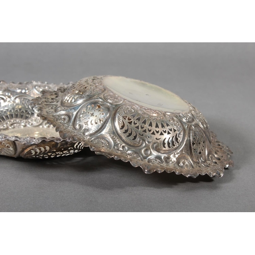 13 - Pair of Scottish silver pierced bowls with heavy repousse decoration, 18cm diameter, Hamilton & ... 
