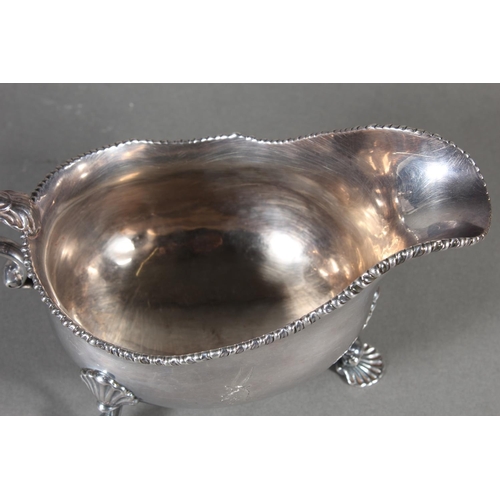 24 - Geo III silver sauce boat with gadrooned edge and raised on three shell shaped feet, Daniel Smith &a... 