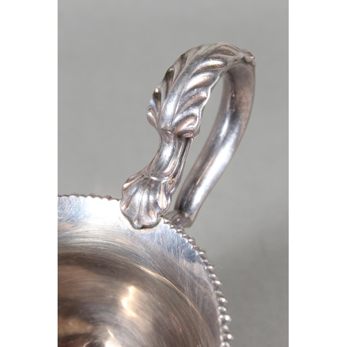 24 - Geo III silver sauce boat with gadrooned edge and raised on three shell shaped feet, Daniel Smith &a... 
