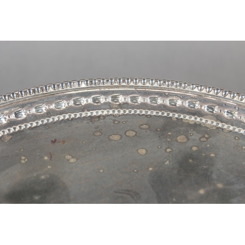 37 - Victorian silver salver with decorative border and raised on tripod supports, Daniel & John Well... 