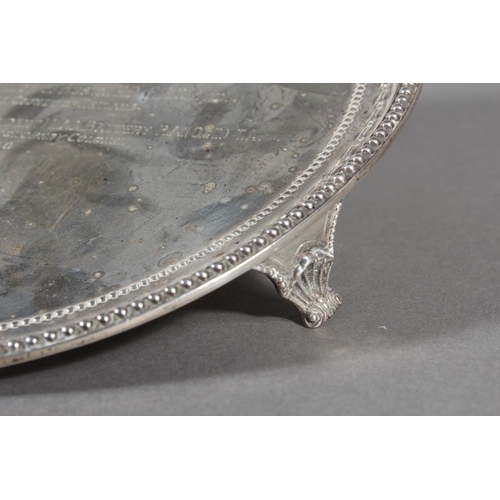 37 - Victorian silver salver with decorative border and raised on tripod supports, Daniel & John Well... 