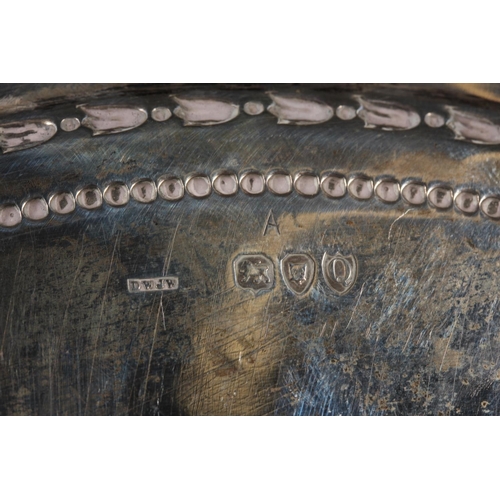 37 - Victorian silver salver with decorative border and raised on tripod supports, Daniel & John Well... 