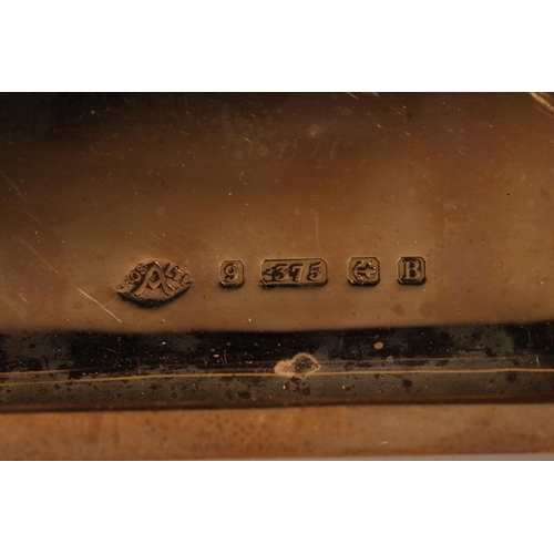 106 - 9ct yellow gold cigarette case of curved form, the front cover with initialled monogram,&nbsp;Adie B... 