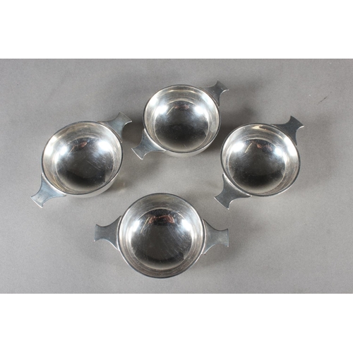 11 - Set of four silver twin handled quaichs or salts of plain form,&nbsp;Roberts & Belk Ltd, London,... 