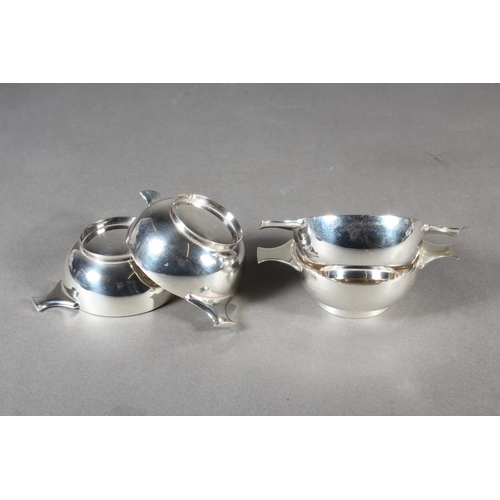 11 - Set of four silver twin handled quaichs or salts of plain form,&nbsp;Roberts & Belk Ltd, London,... 