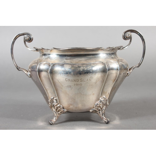 40 - Geo V silver sugar bowl with loop handles raised on whorl feet, '1st Arab Hacks, Grand Slam, 1910', ... 