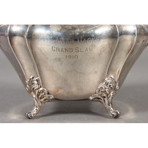 40 - Geo V silver sugar bowl with loop handles raised on whorl feet, '1st Arab Hacks, Grand Slam, 1910', ... 