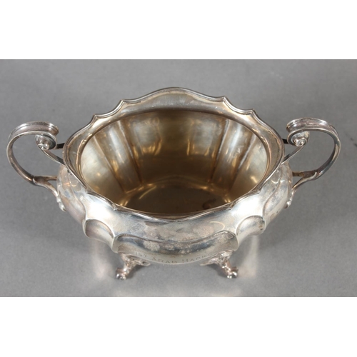 40 - Geo V silver sugar bowl with loop handles raised on whorl feet, '1st Arab Hacks, Grand Slam, 1910', ... 