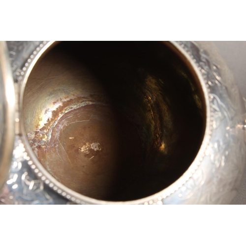 48 - Victorian silver three piece tea service with heavy foliate decoration, loop handle and knop to the ... 