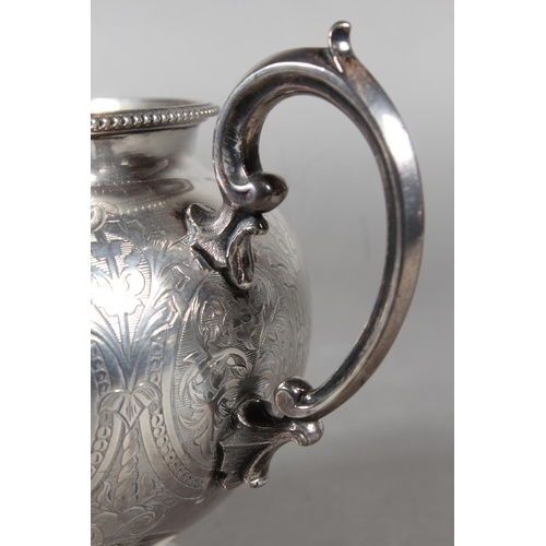 48 - Victorian silver three piece tea service with heavy foliate decoration, loop handle and knop to the ... 
