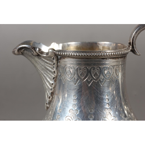 48 - Victorian silver three piece tea service with heavy foliate decoration, loop handle and knop to the ... 