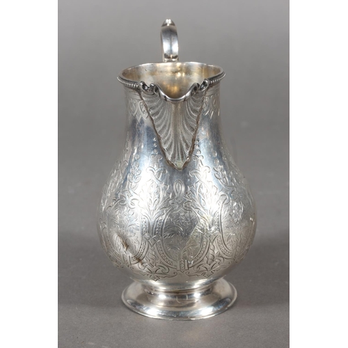 48 - Victorian silver three piece tea service with heavy foliate decoration, loop handle and knop to the ... 