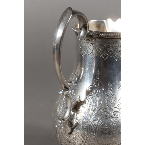 48 - Victorian silver three piece tea service with heavy foliate decoration, loop handle and knop to the ... 