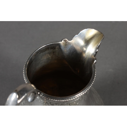 48 - Victorian silver three piece tea service with heavy foliate decoration, loop handle and knop to the ... 