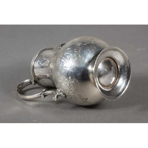 48 - Victorian silver three piece tea service with heavy foliate decoration, loop handle and knop to the ... 