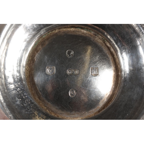 48 - Victorian silver three piece tea service with heavy foliate decoration, loop handle and knop to the ... 