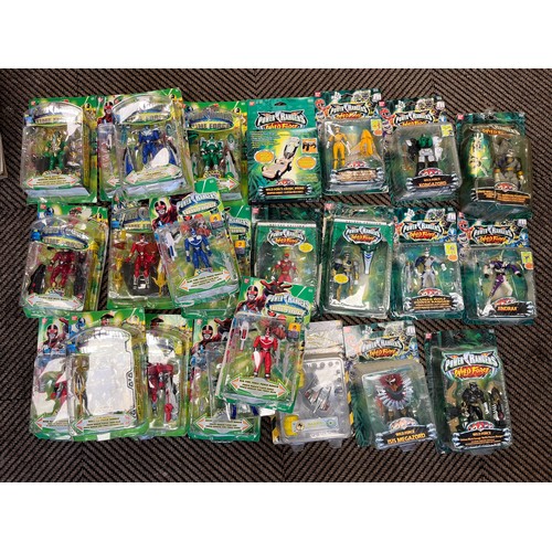 Collection of Power Ranger figures and figure sets.