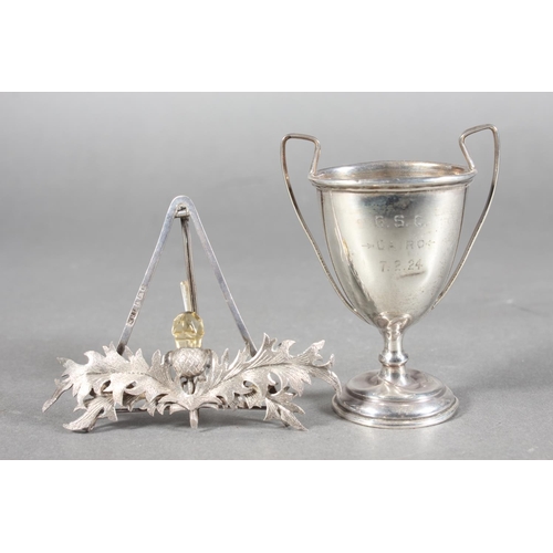 Silver easel stand with faceted citrine set thistle, maker WHL ...