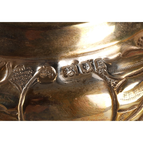 118 - Pair of George V silver candlesticks, J.R, London 1918-19, with knopped stem embossed with flowerhea... 