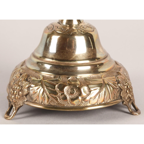 118 - Pair of George V silver candlesticks, J.R, London 1918-19, with knopped stem embossed with flowerhea... 