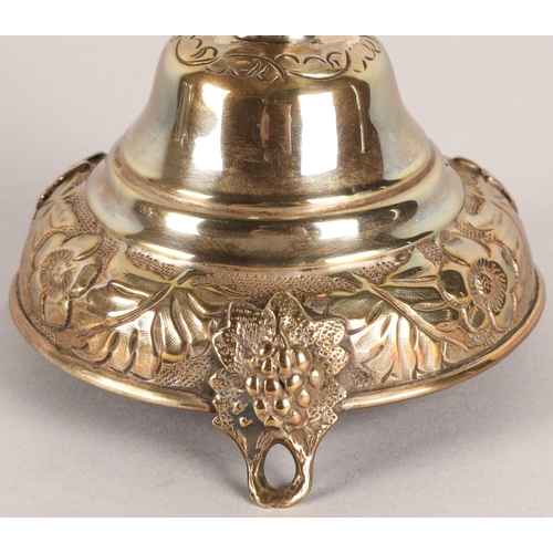 118 - Pair of George V silver candlesticks, J.R, London 1918-19, with knopped stem embossed with flowerhea... 