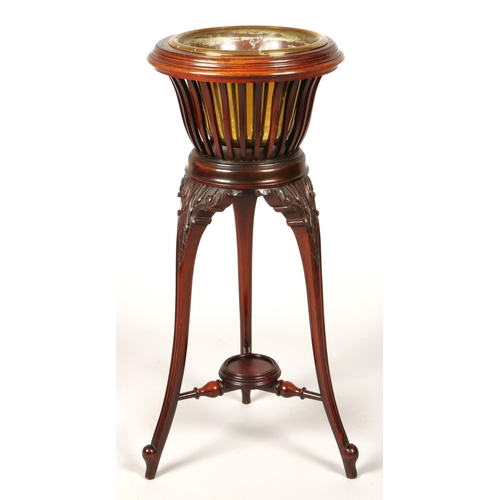 356 - Mahogany jardiniere stand with brass insert, 83cm high, 37cm diameter