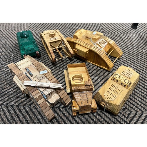 Collection of wooden hand built model tanks