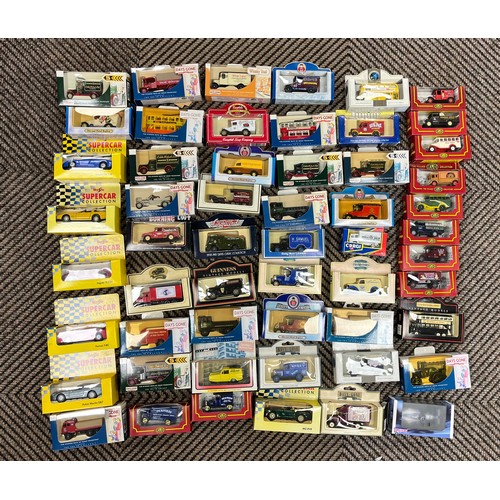 Collection of boxed die-cast model cars.