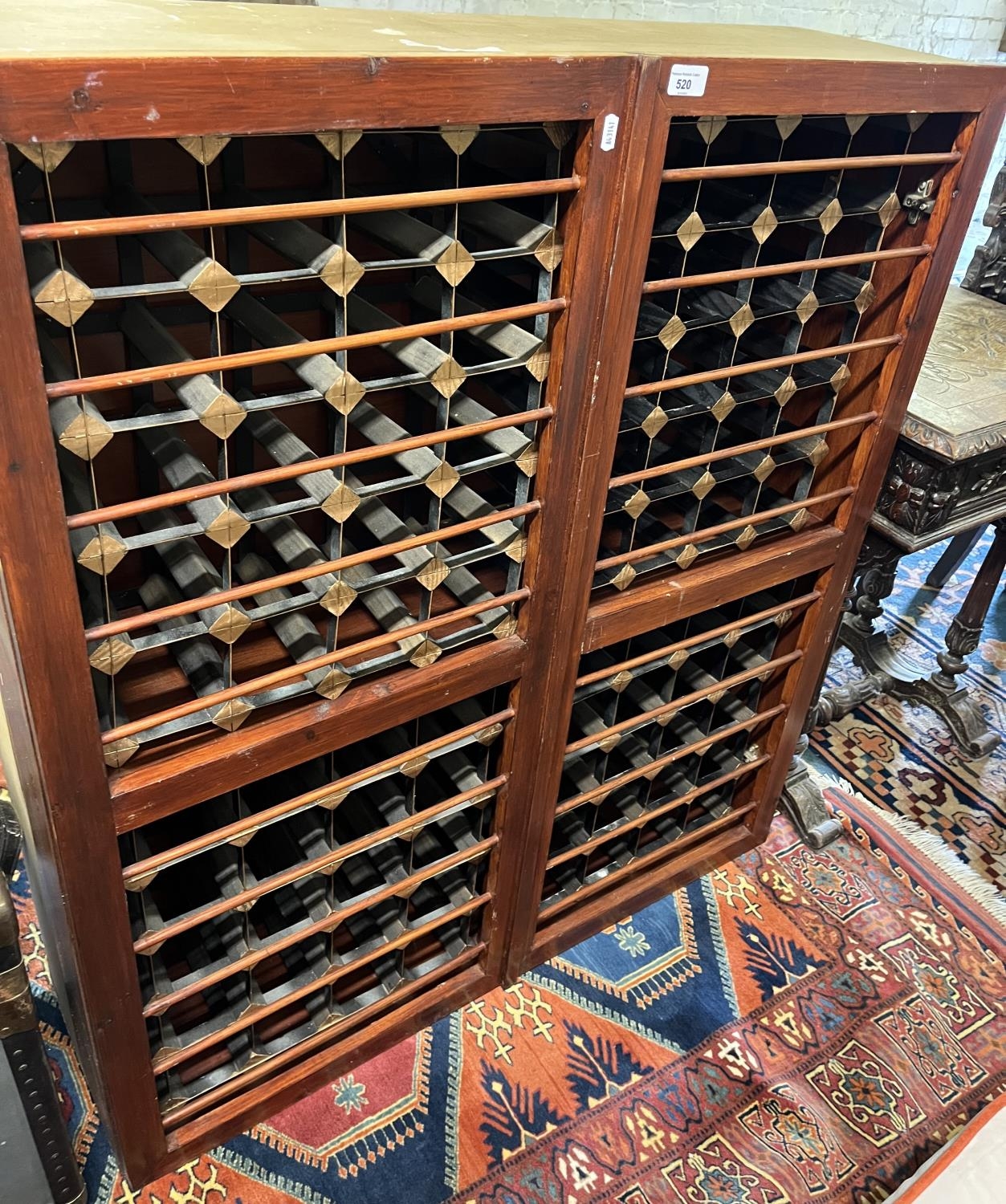 Two door sectional wine cabinet.