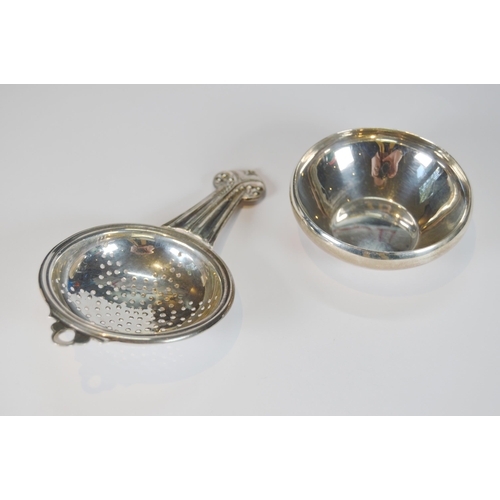 24 - Silver tea strainer, the stem handle of Secessionist theme, with bowl, by Louis Simpson Ltd., London... 