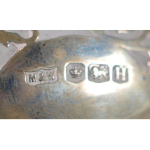 25 - Silver sugar bowl with twin handles and pierced foliage to the border, on moulded circular foot, by ... 