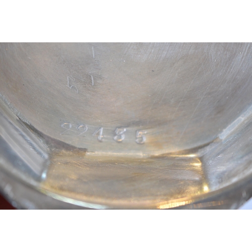 33 - George V silver christening mug with faceted dimples, scroll handle, on octagonal foot, by SW Smith ... 