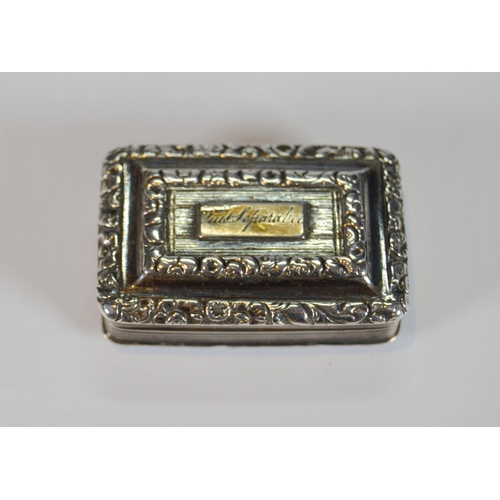 38 - Two Georgian silver vinaigrettes, c. 1820s, each with an engraved cartouche to the hinged top and gi... 