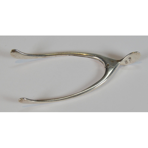 41 - George III silver caddy spoon in the form of a spade, Birmingham, 7.5cm long, and a pair of Birmingh... 