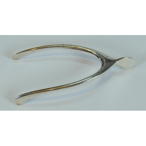 41 - George III silver caddy spoon in the form of a spade, Birmingham, 7.5cm long, and a pair of Birmingh... 