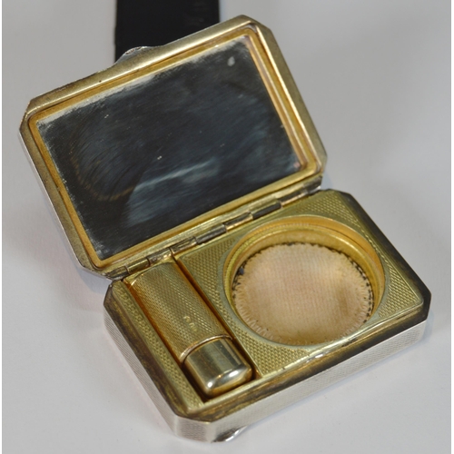 43 - Art Deco blue, orange and black enamelled silver compact containing lipstick and powder within, engi... 
