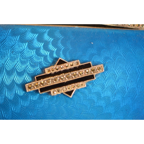 43 - Art Deco blue, orange and black enamelled silver compact containing lipstick and powder within, engi... 