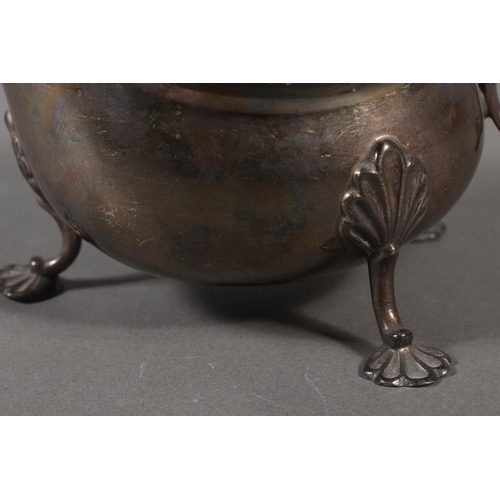 53 - Silver sauce boat with wavy edged rim raised on paw supports with scrolling handle, Walker & Hal... 