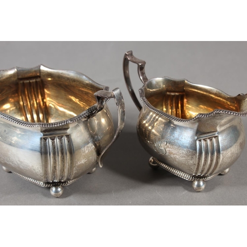 61 - Geo V silver four piece tea service raised on ball feet, Fenton, Russell & Co Ltd, London, 1913,... 