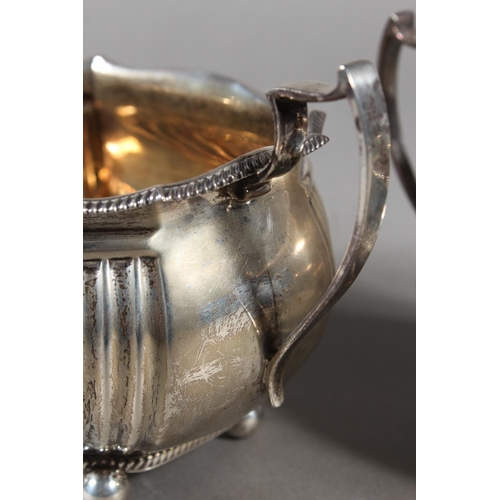 61 - Geo V silver four piece tea service raised on ball feet, Fenton, Russell & Co Ltd, London, 1913,... 