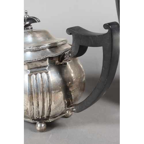 61 - Geo V silver four piece tea service raised on ball feet, Fenton, Russell & Co Ltd, London, 1913,... 