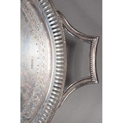63 - Victorian silver twin handled tray of oval form, the tray with beadwork edge and pierced border and ... 