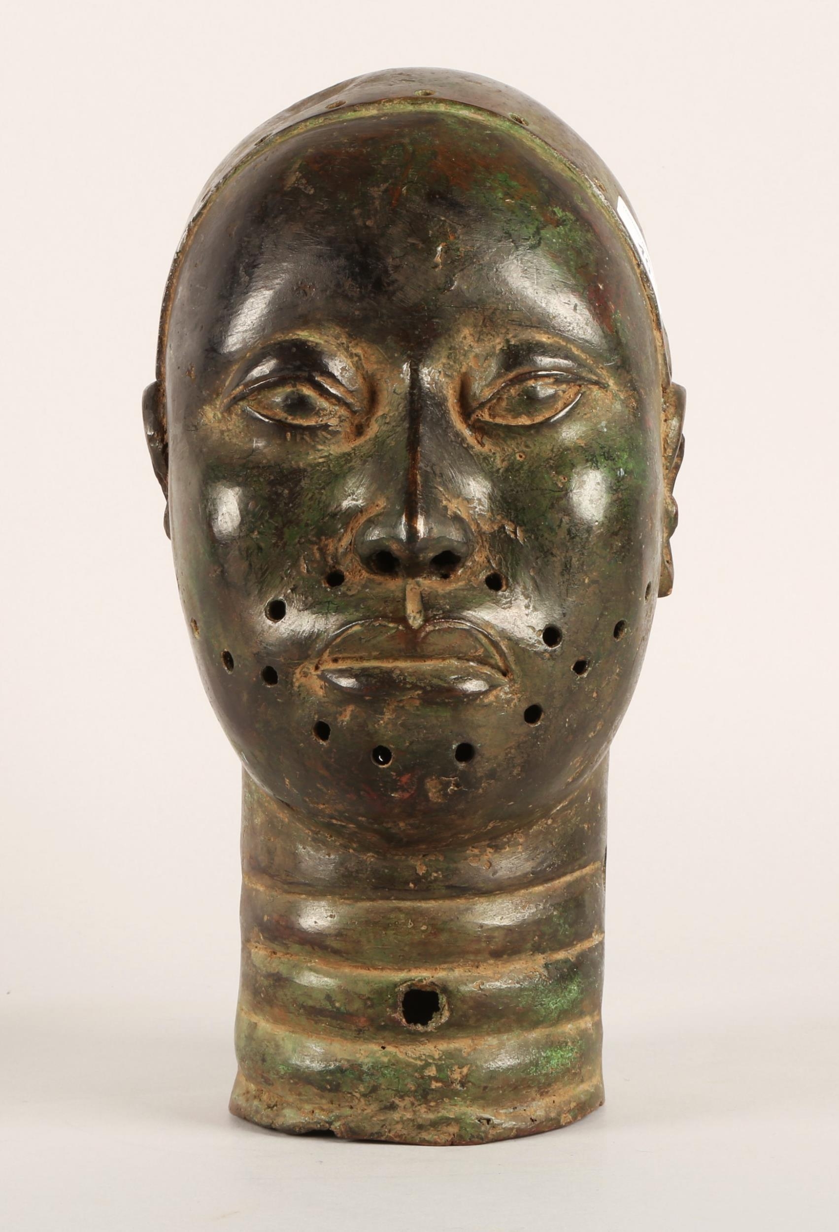 Bronzed metal 'Head of an Oba' in the Benin style, 33cm h.