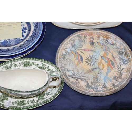 44 - Ceramics and dishes including a Royal Doulton plate, a fish service, a blue and white plate, etc.