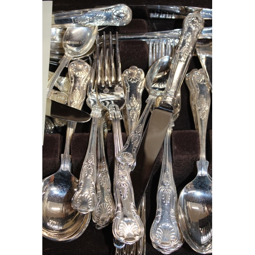 55 - Cased canteen of silver-plated flatware.