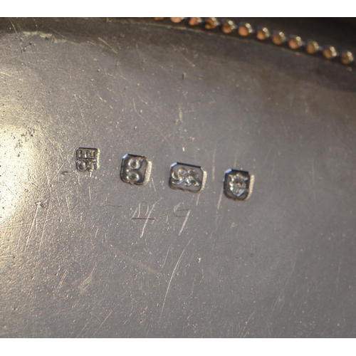 48 - Good George III silver circular tray with moulded beaded edge, on similar cast feet, crested, by Cro... 