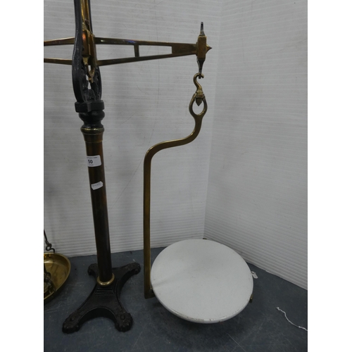 50 - Set of Edwardian brass and cast balance scales, with weights.